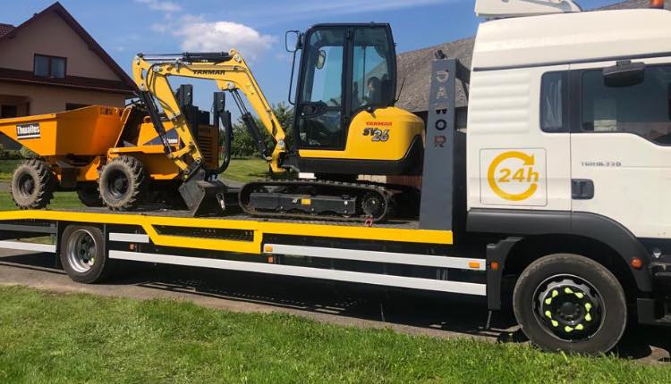 Transport koparki i wozidła na lawecie